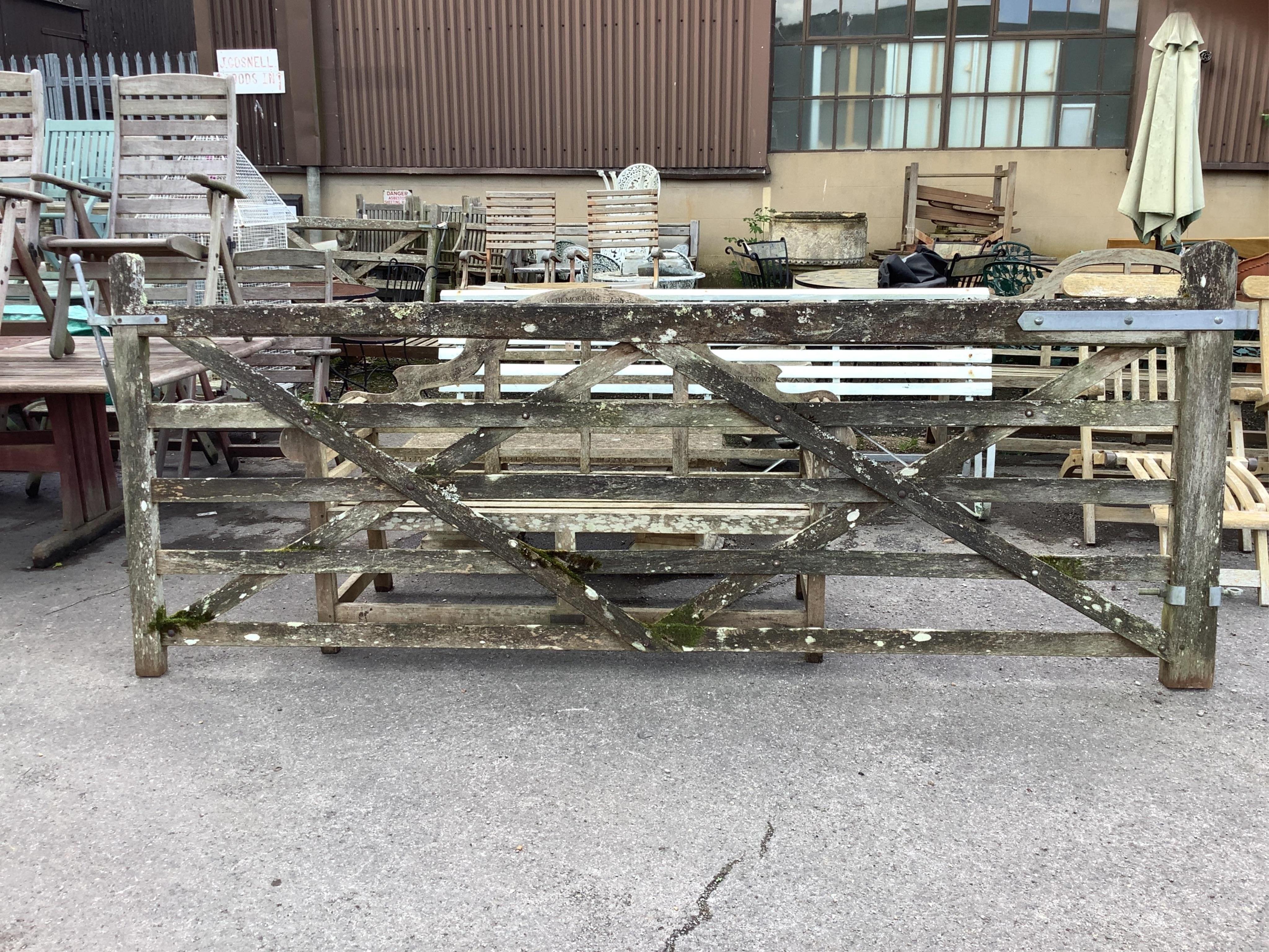 A pair of 10ft Biddenden hardwood gates with galvanised mounts. Condition - fair